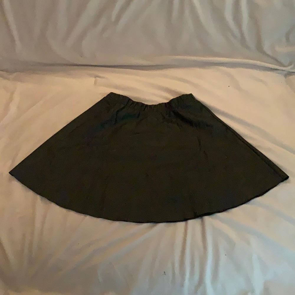 runway story black leather mid length skirt- medium